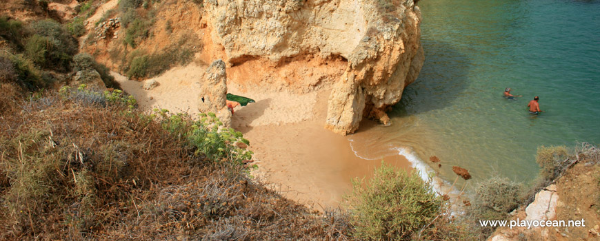 Between cliffs, Praia da Vigia Beach