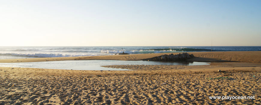 Puddle at Praia da Polvoeira Beach