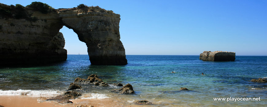 Natural arc at Praia da Estaquinha Beach